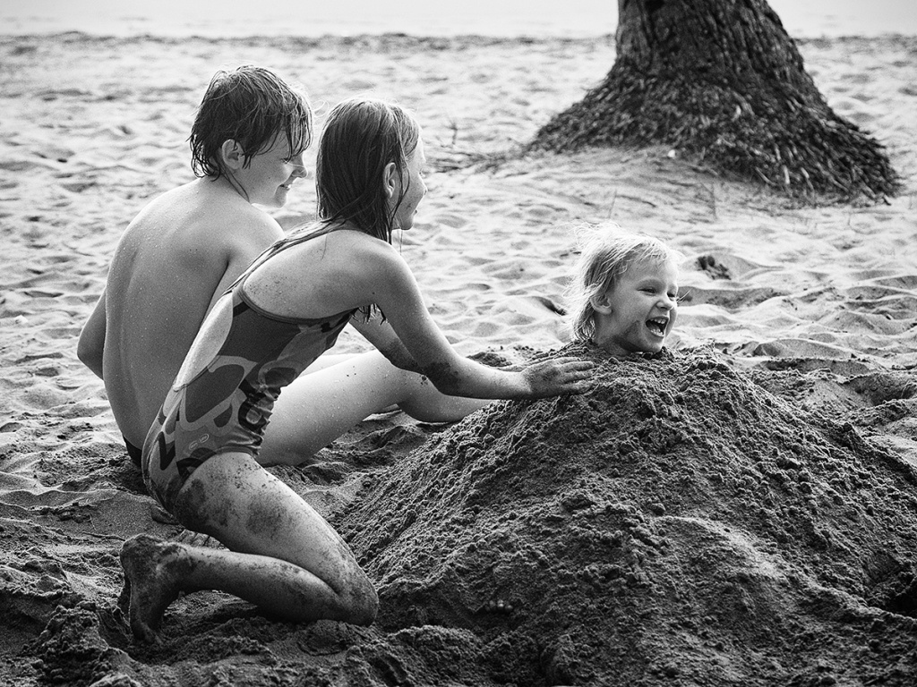Genießen Sie den Urlaub mit der Fotokamera - Meer und Sand