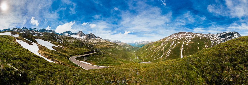Landschaften während des Tages und bei Regen fotografieren: Panorama mit mehr Bewölkung.